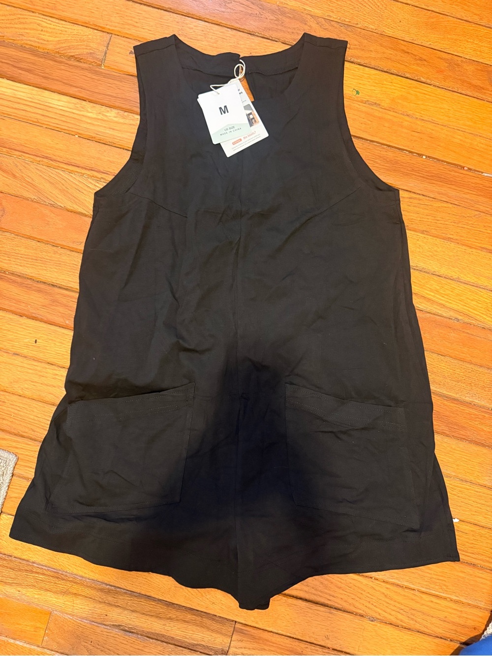 Women's Black Sleeveless Romper with Front Pockets - Unbranded